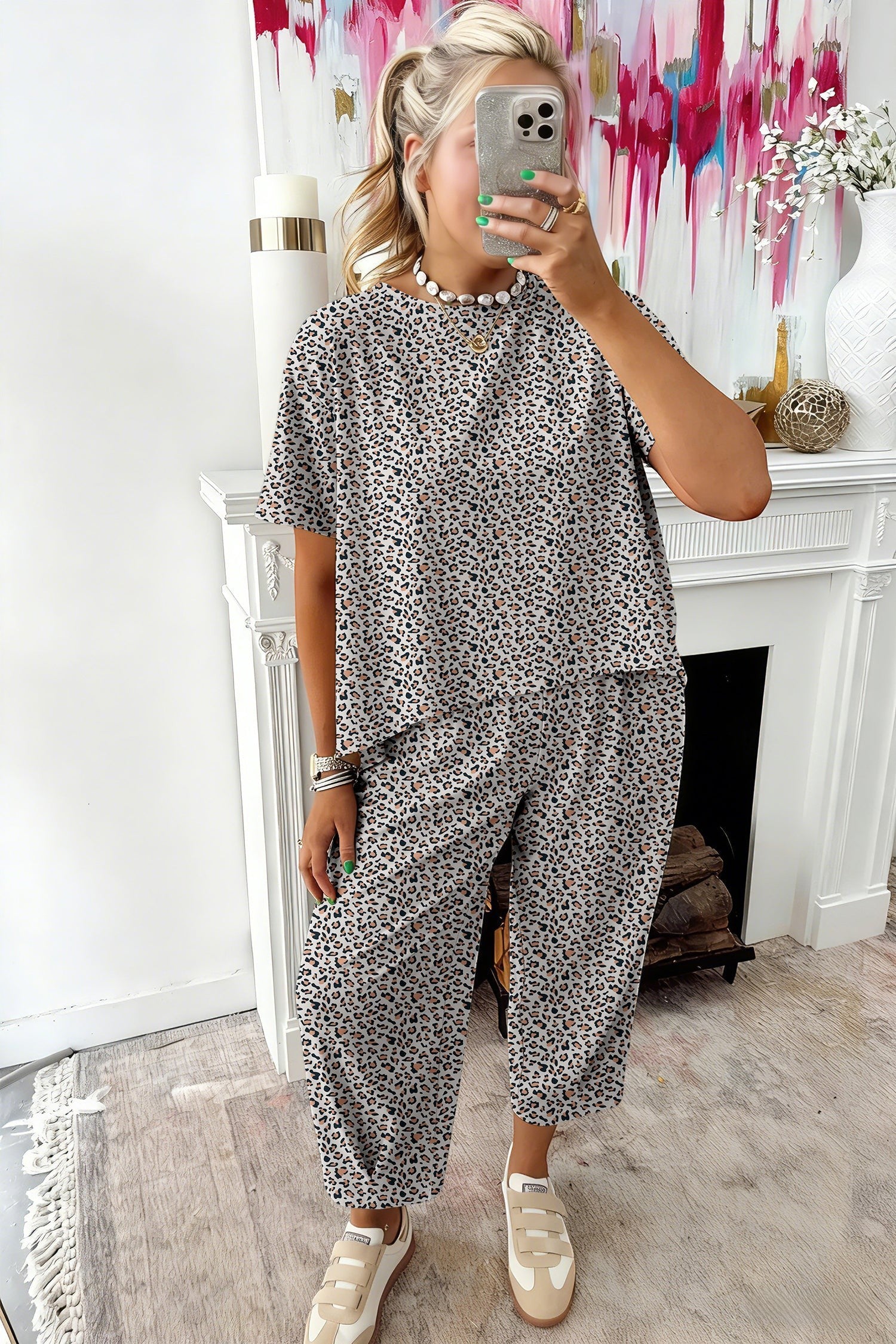 Doodlations Coffee Bar & Boutique leopard print lounge set with short-sleeve top and cropped pants.