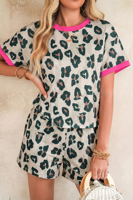 Doodlations Coffee Bar & Boutique The Leslie leopard print two-piece short set with pink trim. Loose fit top and coordinating shorts.
