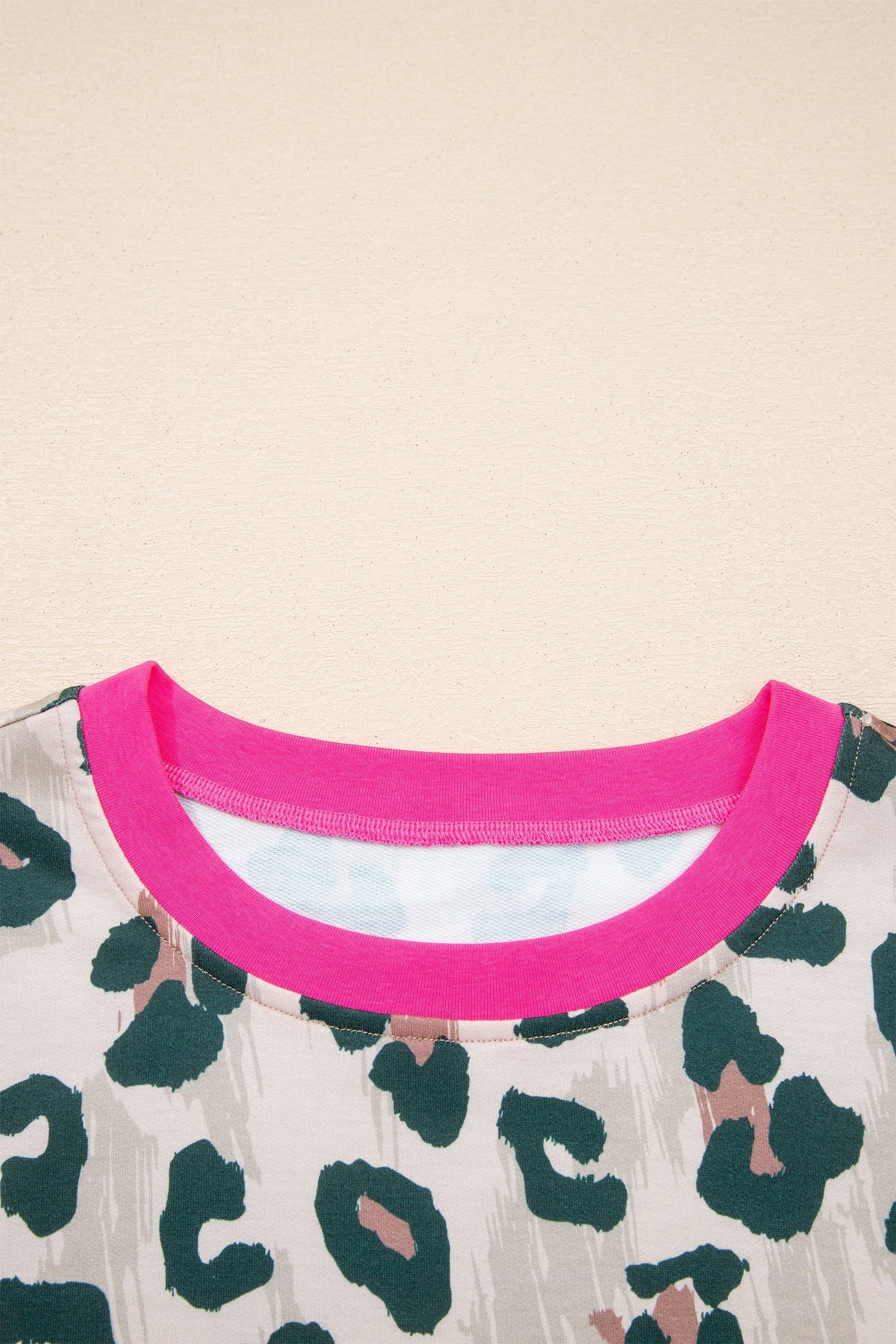 Doodlations Coffee Bar & Boutique The Leslie two-piece set: brown leopard print top with pink trim and matching shorts.