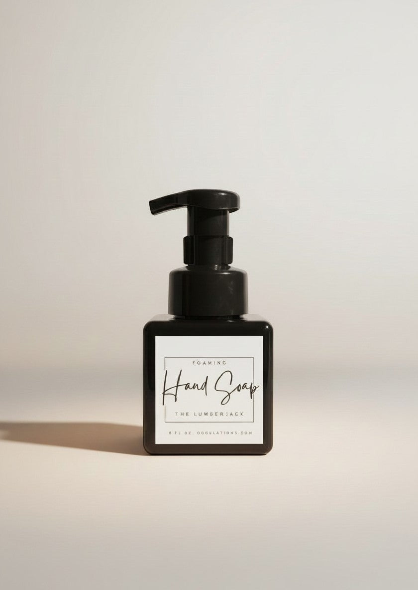 Doodlations Coffee Bar & Boutique The Lumberjack foaming hand soap in a minimalist black bottle with a white label.