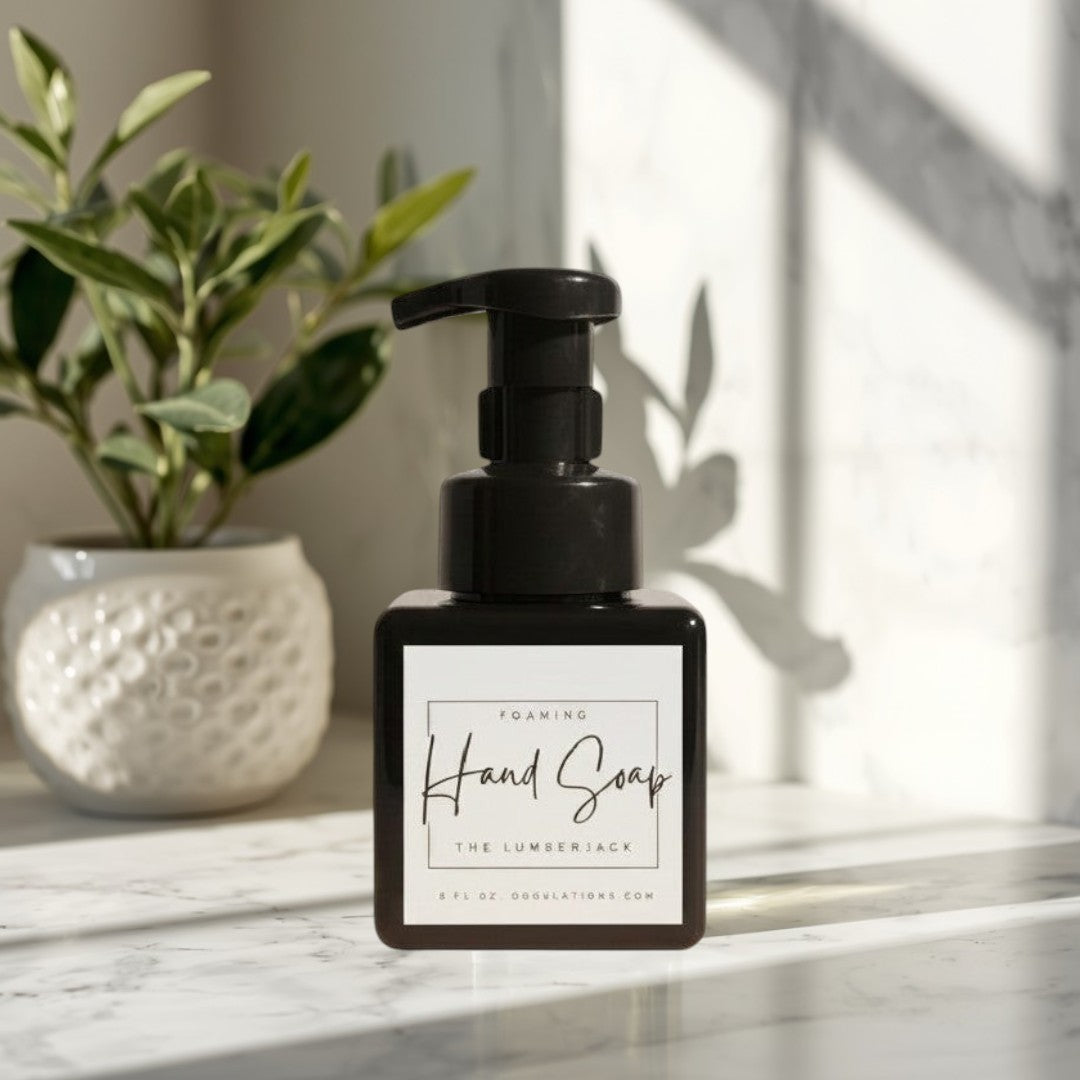 Doodlations Coffee Bar & Boutique The Lumberjack foaming hand soap in a minimalist black bottle with a white label.