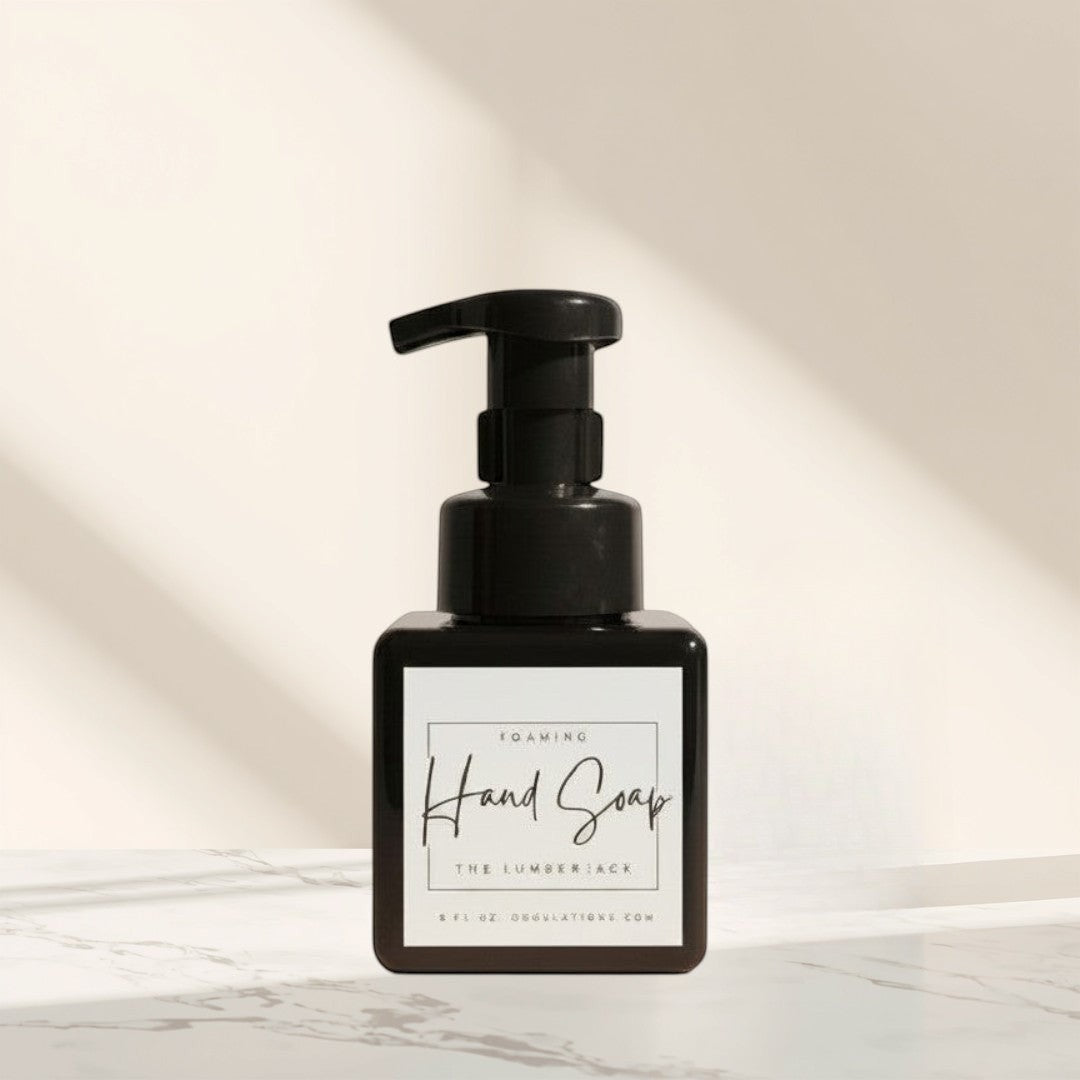 Doodlations Coffee Bar & Boutique The Lumberjack foaming hand soap in a minimalist black bottle with a white label.