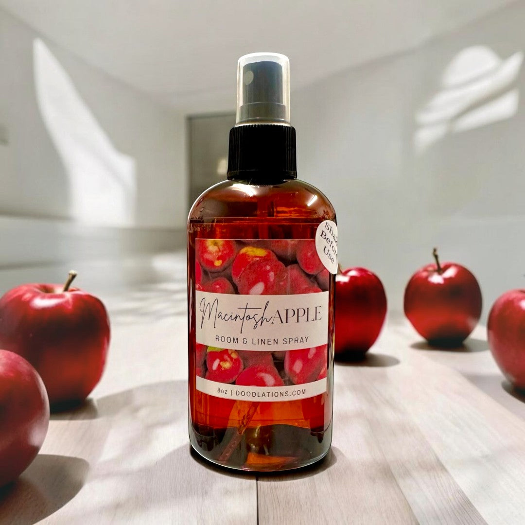 Doodlations Coffee Bar & Boutique Macintosh Apple Room & Linen Spray in amber bottle with apple label. 8oz.