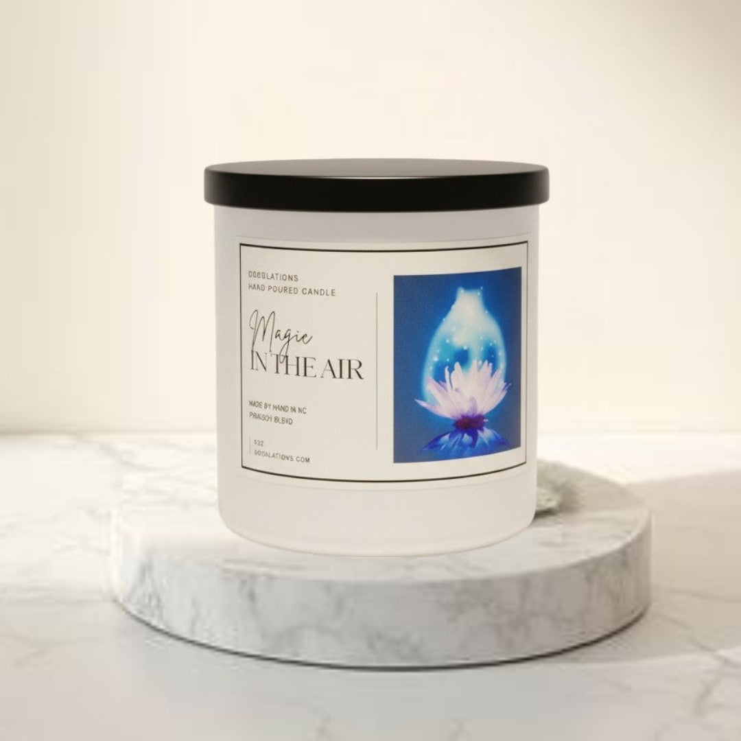 Doodlations Coffee Bar & Boutique Magic in the Air hand-poured candle with floral and vanilla notes.