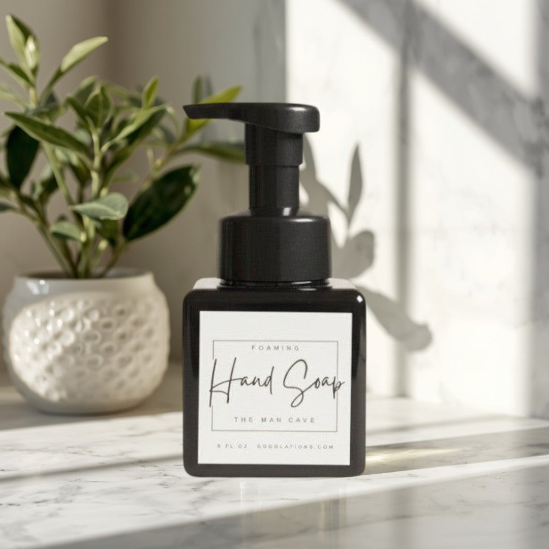 Doodlations Coffee Bar & Boutique Man Cave foaming hand soap in a black square bottle with a black pump dispenser.