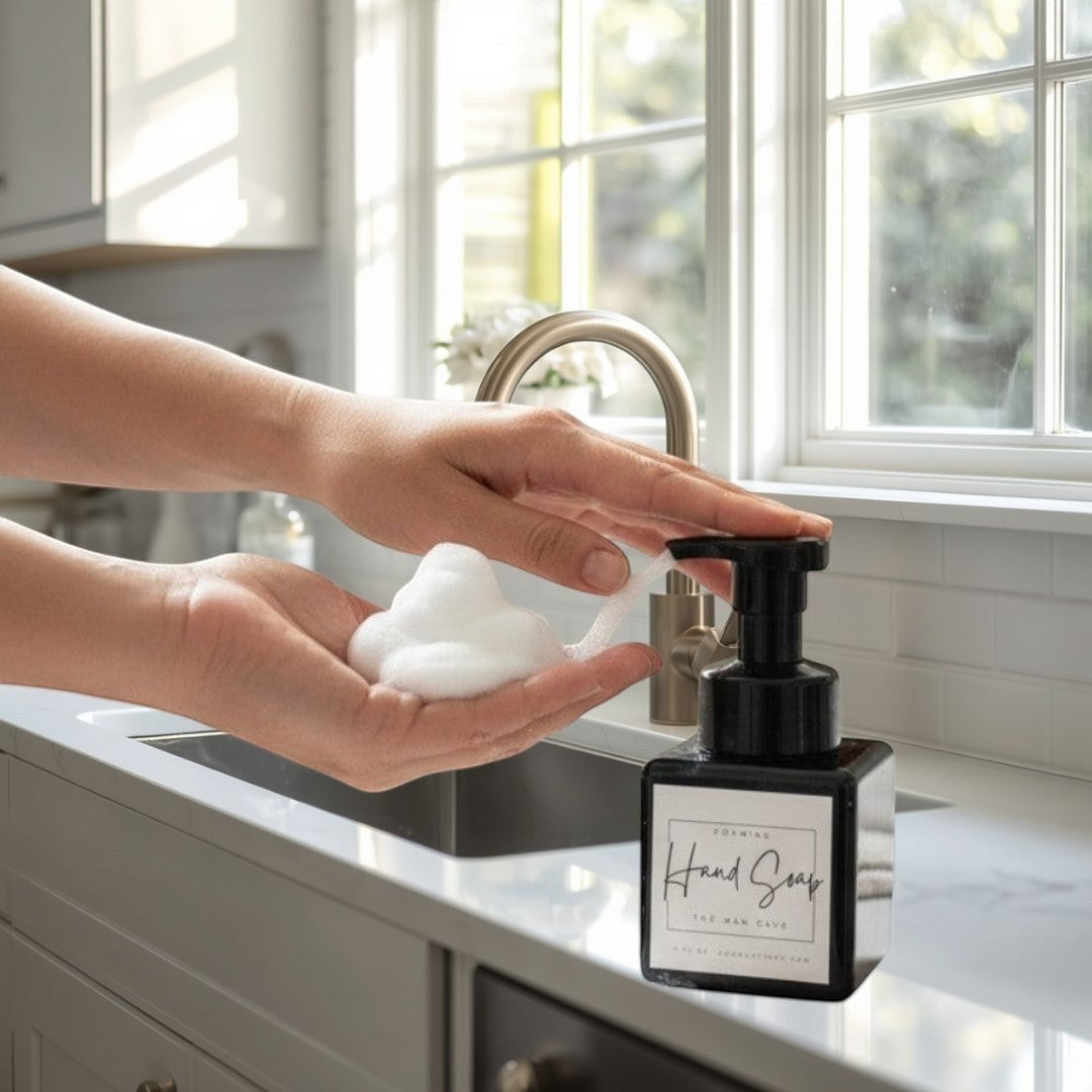 Doodlations Coffee Bar & Boutique Man Cave foaming hand soap in a black square bottle with a black pump dispenser.