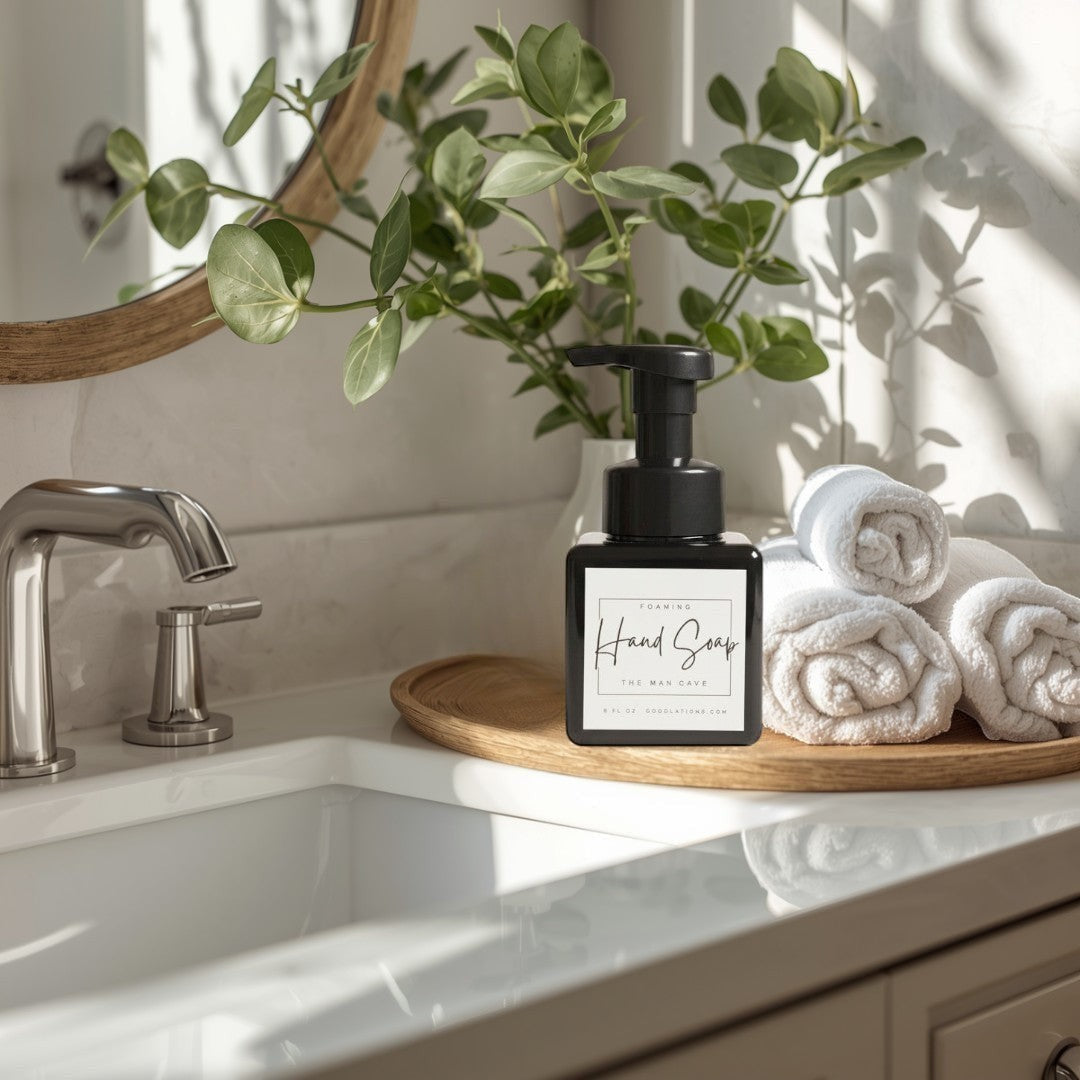 Doodlations Man Cave Foaming Hand Soap in a black square bottle with a pump dispenser. Minimalist label.