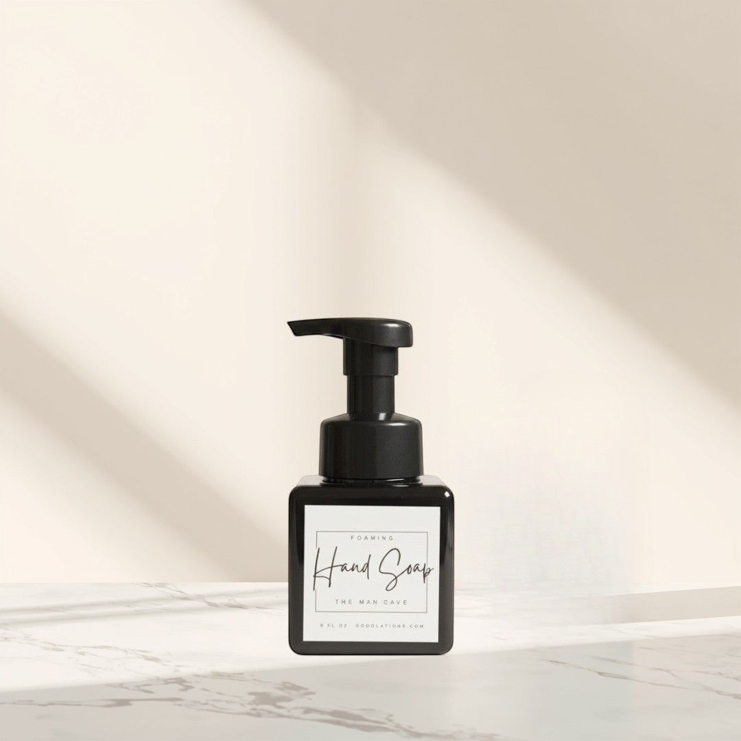Doodlations Man Cave Foaming Hand Soap in a black pump bottle with a minimalist label.