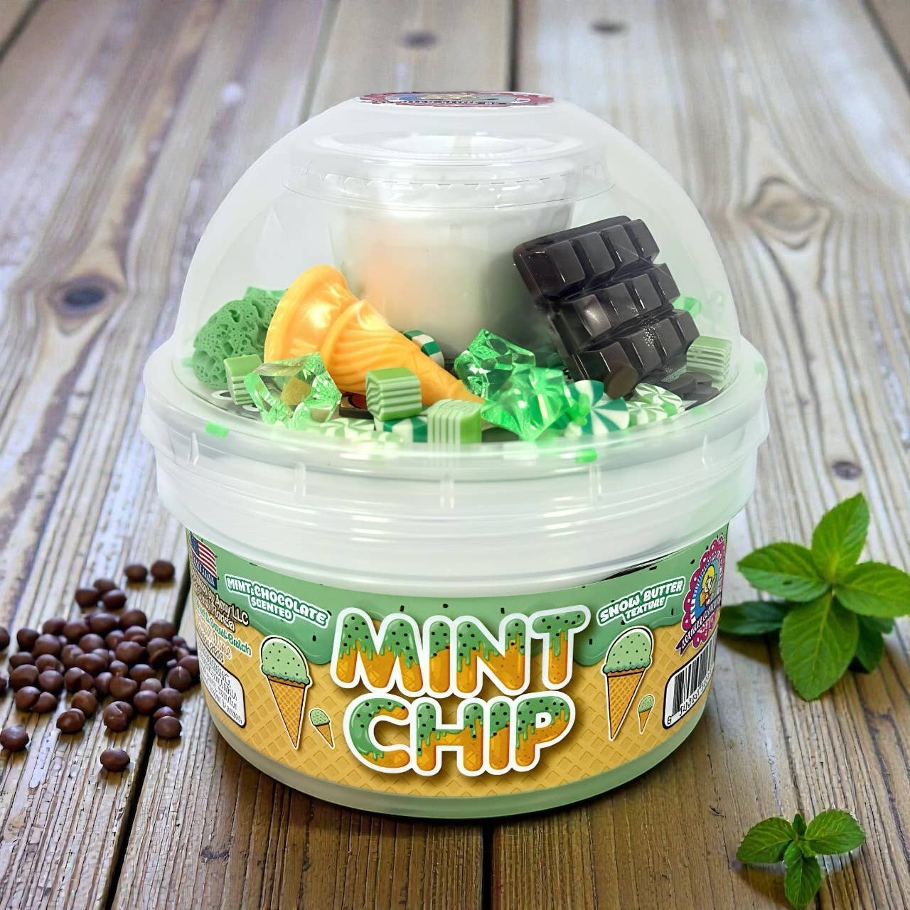 Doodlations Coffee Bar & Boutique Mint Chocolate Chip Ice Cream Slime with chocolate bar, candy, and ice cream cone charms.