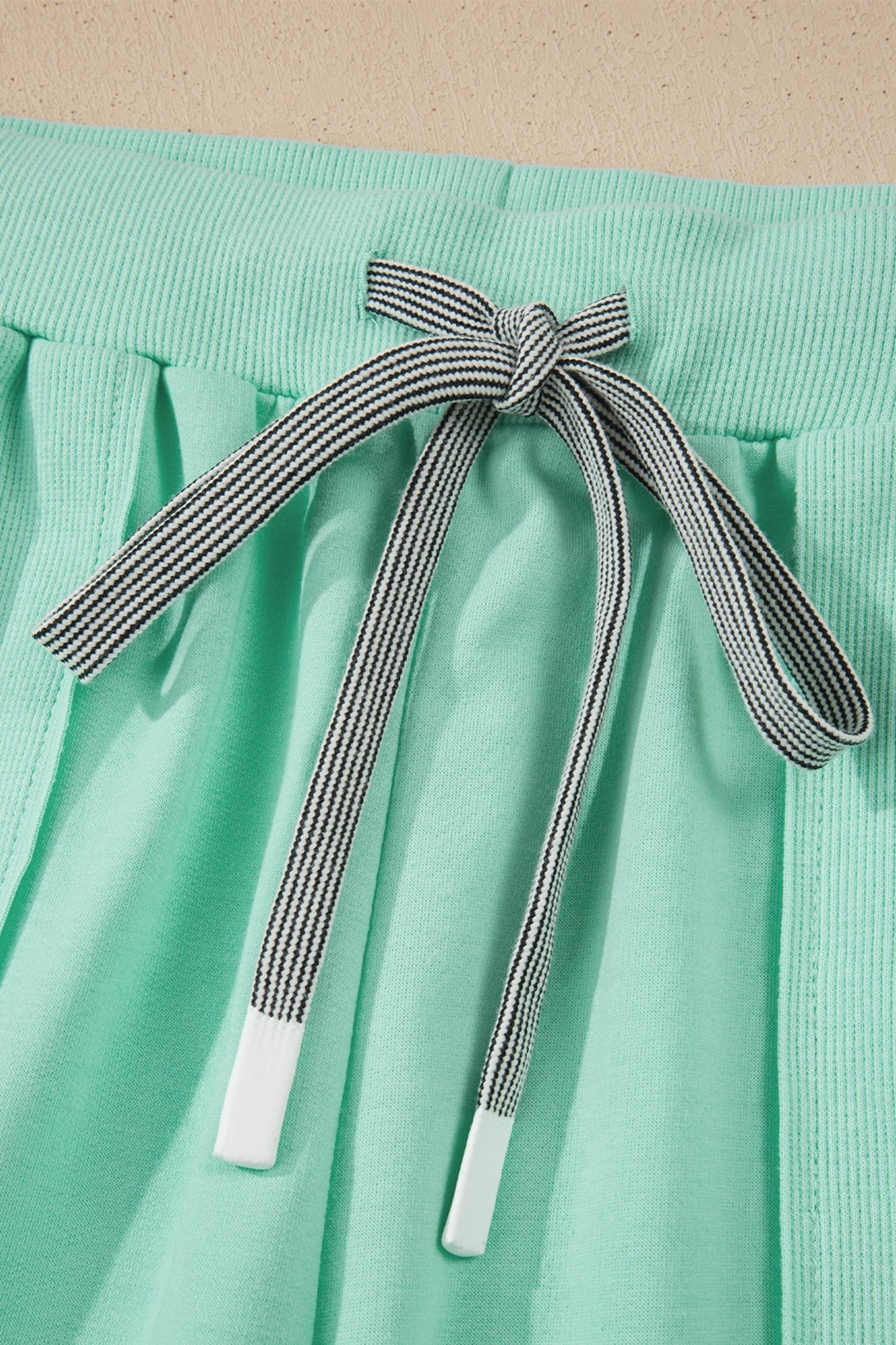 Doodlations Coffee Bar & Boutique mint green lounge set with drawstring and elastic waistband.