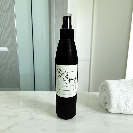 Doodlations Moisturizing Body Spray for men, alcohol-free mist with aloe, butters and oils, 8 oz bottle.