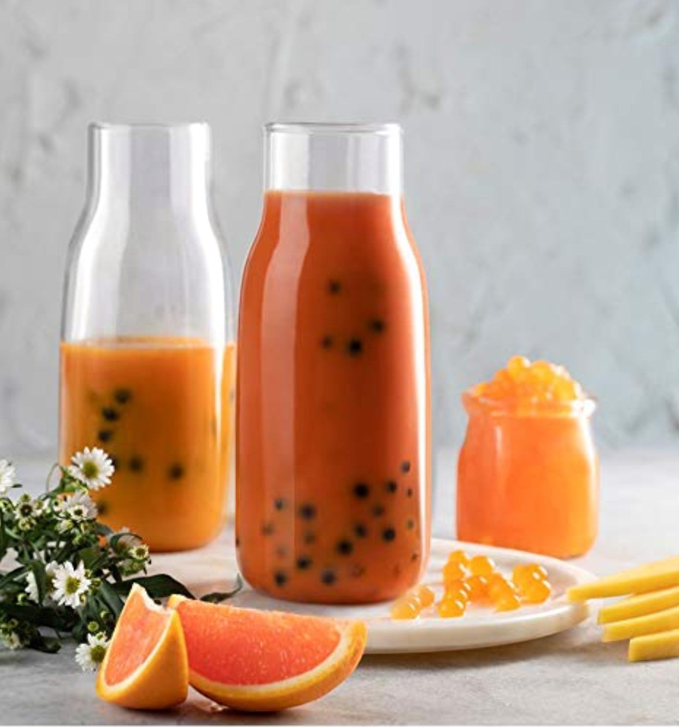 Doodlations Coffee Bar & Boutique passion fruit bursting balls in drink and topping.