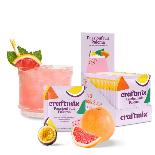 Doodlations Coffee Bar & Boutique Passionfruit Paloma cocktail mix packets with a refreshing pink drink and fresh fruit.