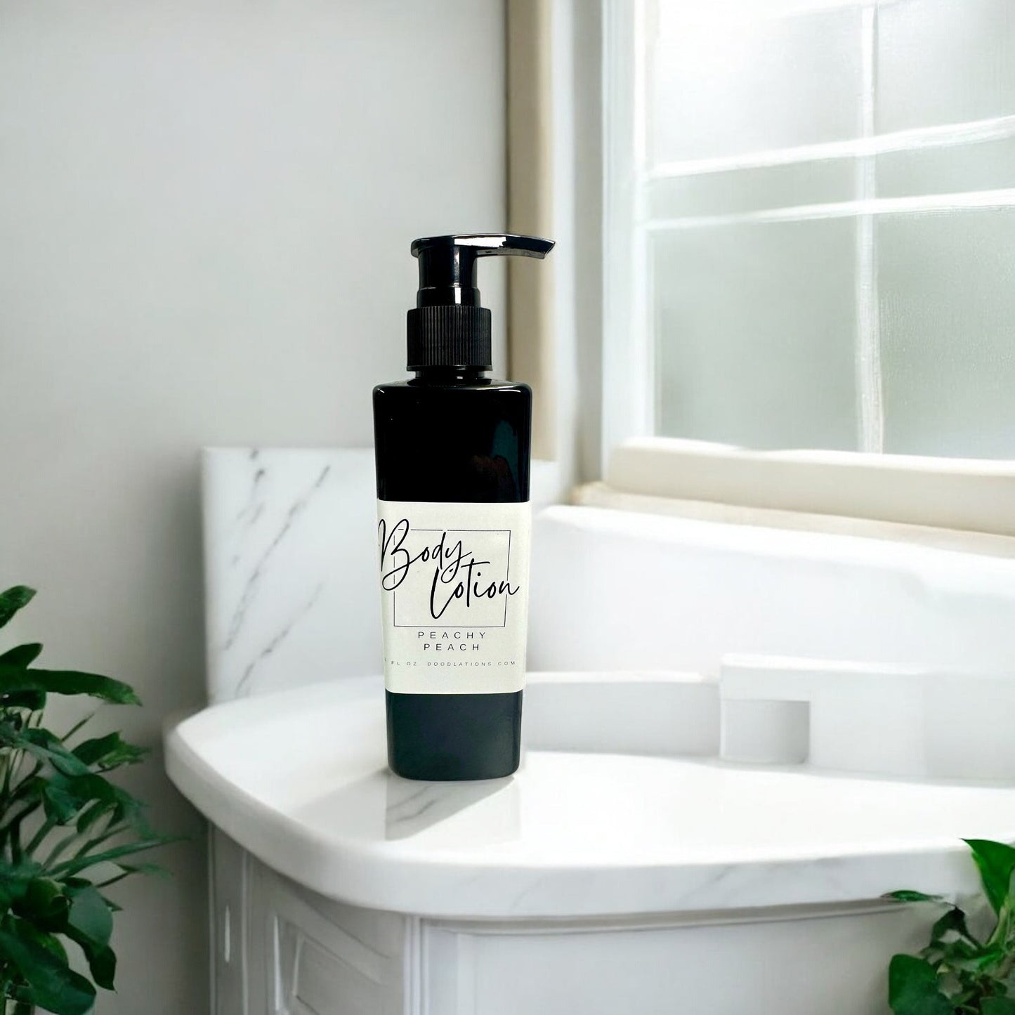 Doodlations Coffee Bar & Boutique Peachy Peach moisturizing body lotion in a black pump bottle, 8oz.