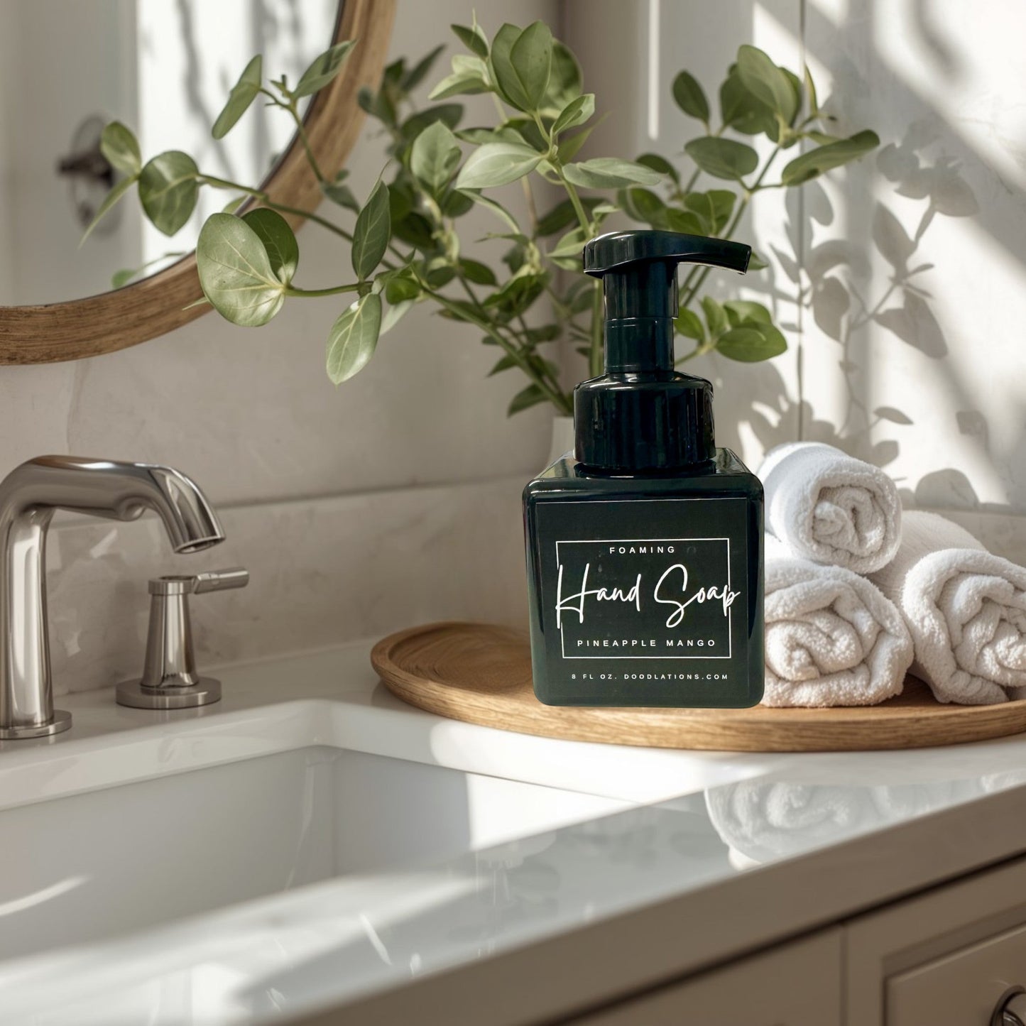 Doodlations Pineapple Mango Foaming Hand Soap in a black square bottle with a black pump dispenser. Tropical scent.