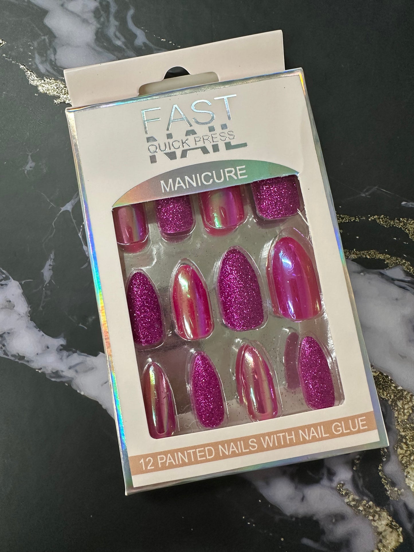 Doodlations Coffee Bar & Boutique Fast Nails Quick Press Manicure set featuring 12 pink chrome and glitter press-on nails.