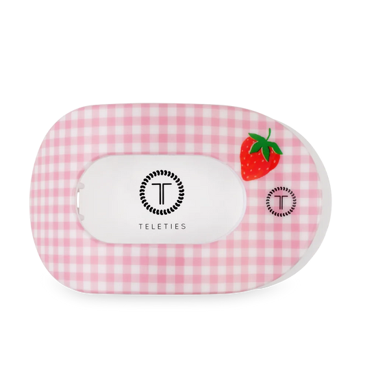 Doodlations Coffee Bar & Boutique pink gingham hair clip with strawberry accent and Teleties logo.