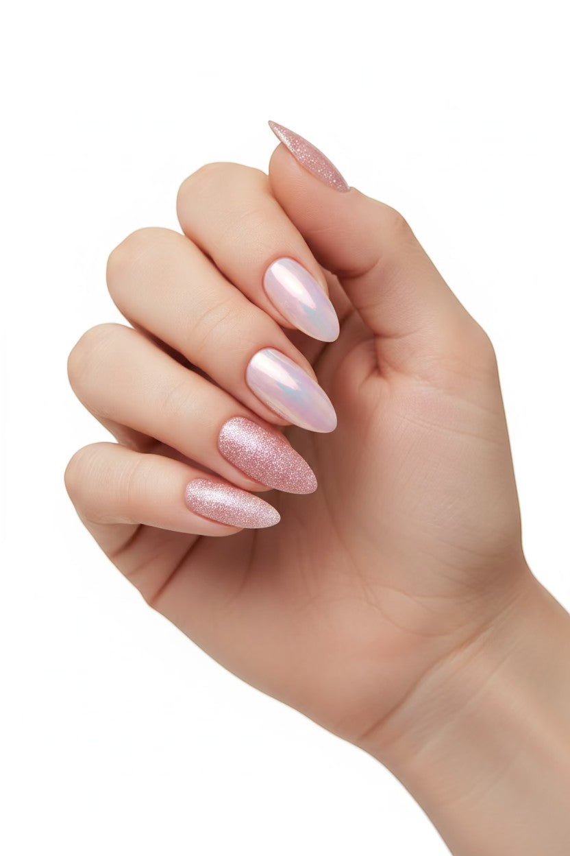 Doodlations Coffee Bar & Boutique pink glitter and chrome almond press-on nails.