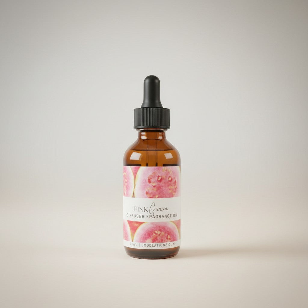 Doodlations Coffee Bar & Boutique Pink Guava diffuser fragrance oil in amber glass bottle with dropper.