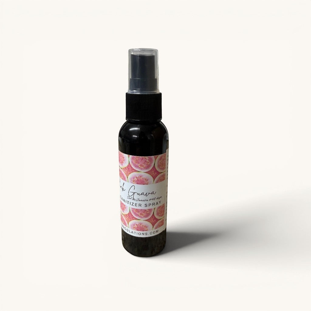 Doodlations Pink Guava hand sanitizer spray with a pink guava pattern label. 2 oz bottle.