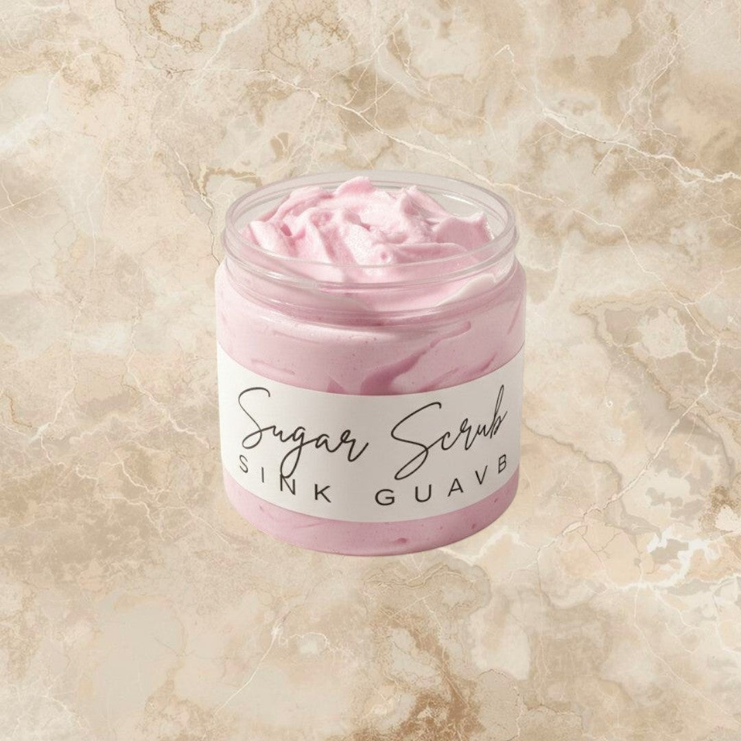Doodlations Coffee Bar & Boutique Pink Guava Sugar Scrub in a clear jar with a white label. Whipped texture, pink color.