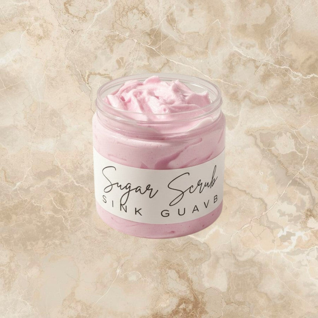Doodlations Coffee Bar & Boutique Pink Guava Sugar Scrub in a clear jar with a white label. Whipped texture, pink color.