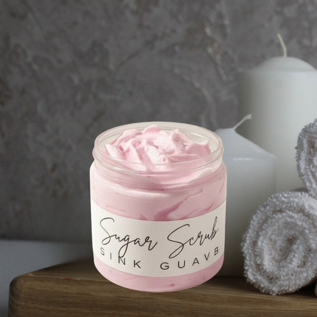 Doodlations Coffee Bar & Boutique Pink Guava Sugar Scrub in a clear jar with whipped texture and white label.