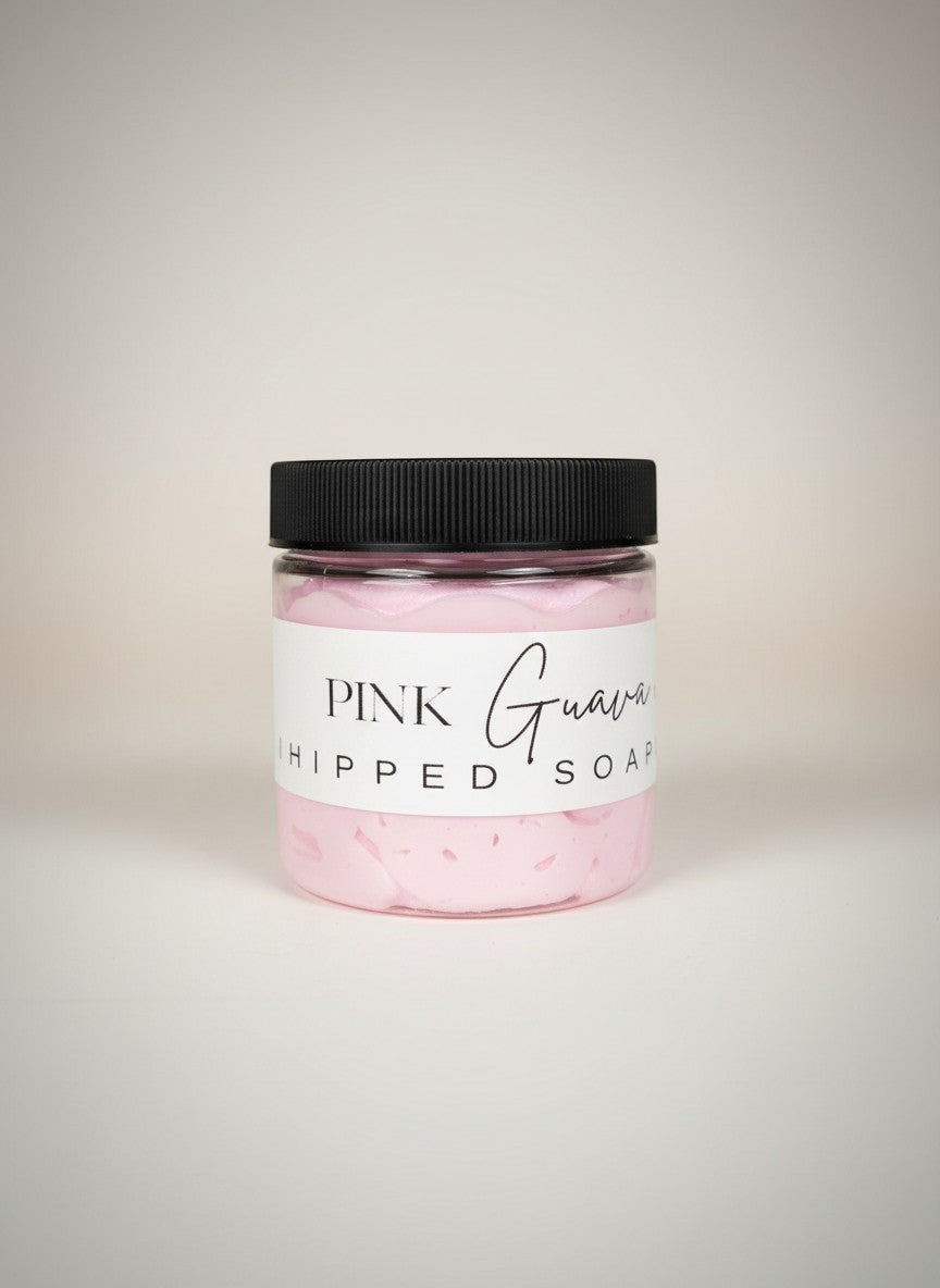 Doodlations Coffee Bar & Boutique Pink Guava Whipped Soap in a clear jar with a black lid. Light pink, fluffy soap with grape seed oil.