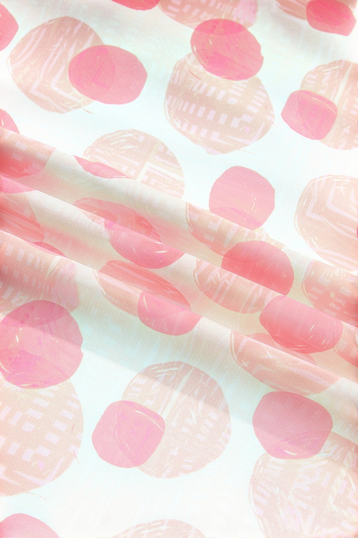 Doodlations Coffee Bar & Boutique pink and white polka dot midi dress with smocked waist and flutter sleeves.