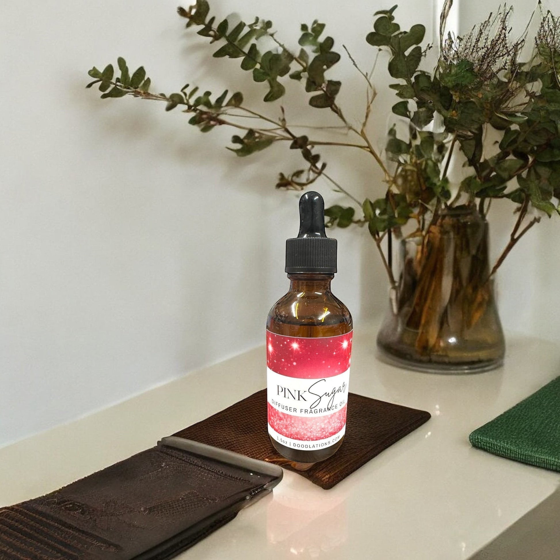 Doodlations Coffee Bar & Boutique Pink Sugar fragrance oil in amber glass bottle with dropper, 1.6oz.