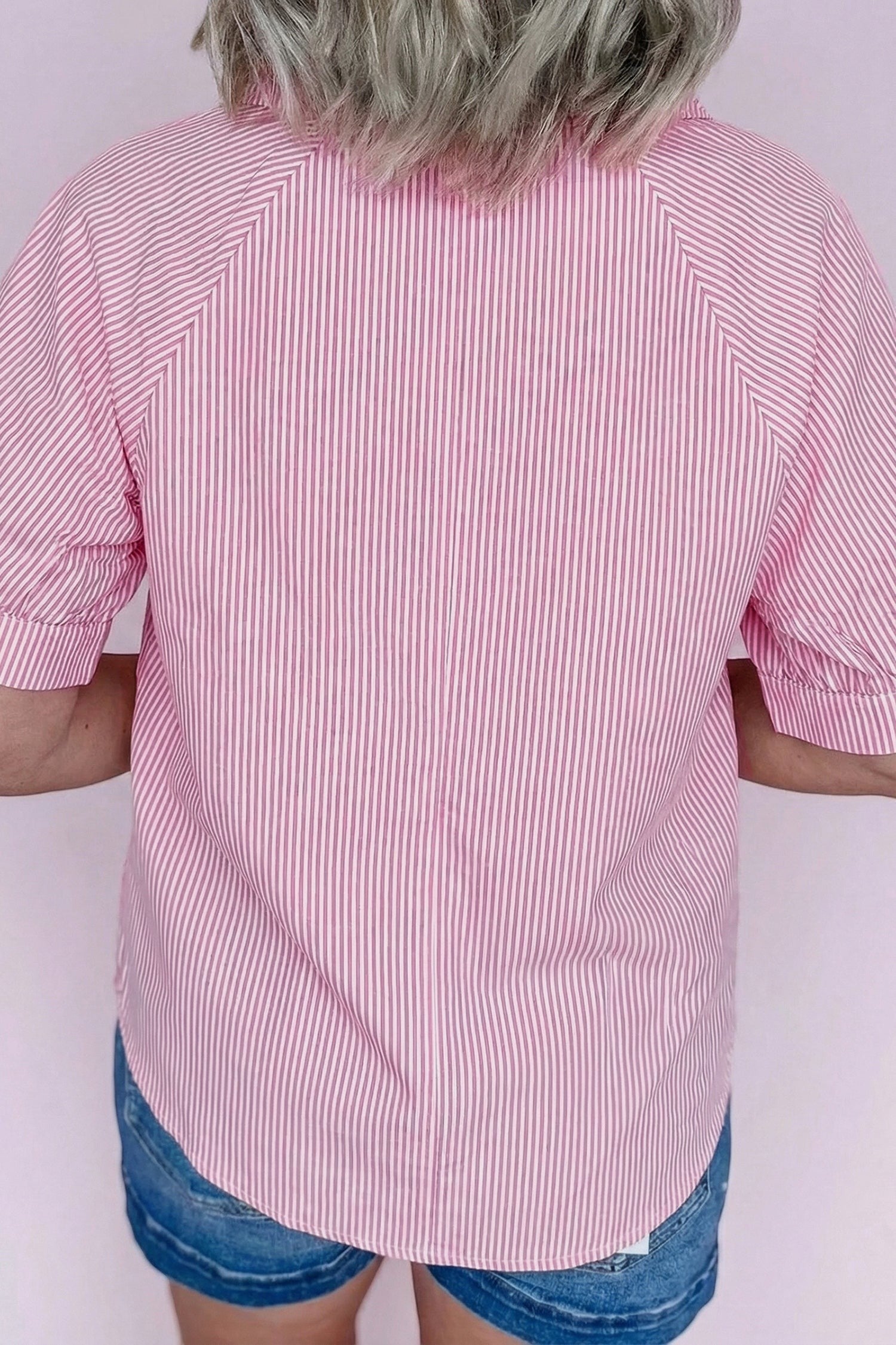 Doodlations Coffee Bar & Boutique pink and white striped collared tie sleeve top. Breathable fabric with V-split neckline.