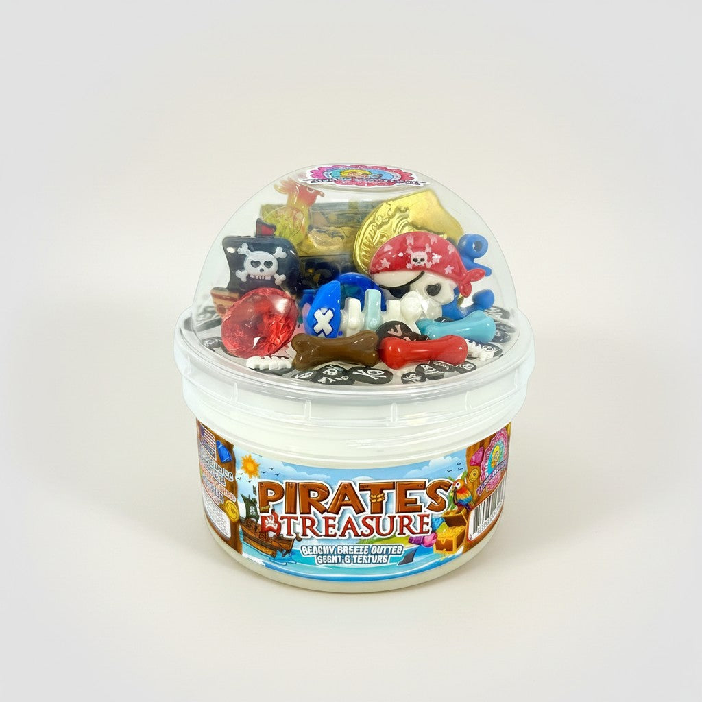 Doodlations Coffee Bar & Boutique Pirates Treasure butter slime with pirate charms, gems, coins, and treasure chest.