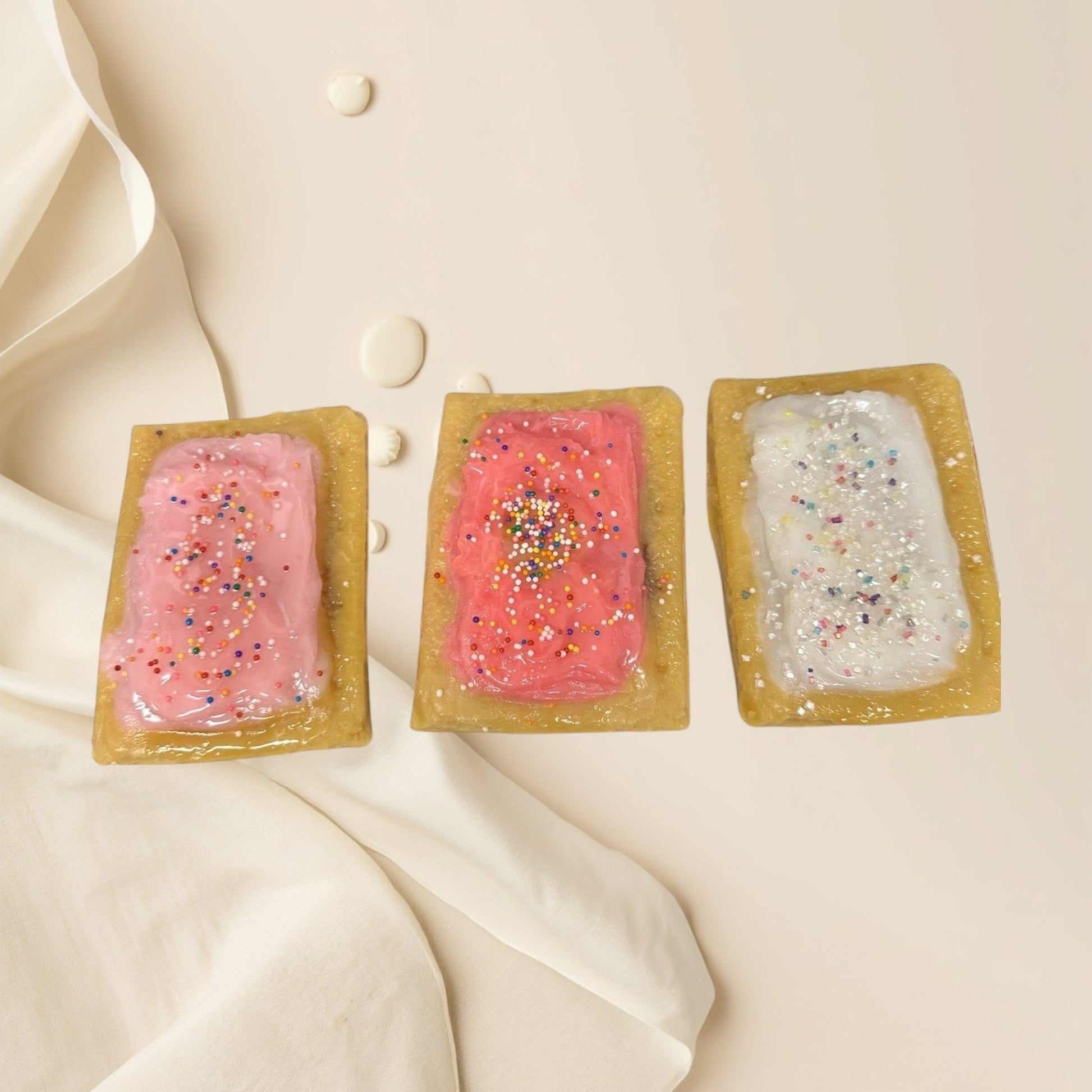 Doodlations Coffee Bar & Boutique PopTart wax melts in pink and white frosting with colorful sprinkles.