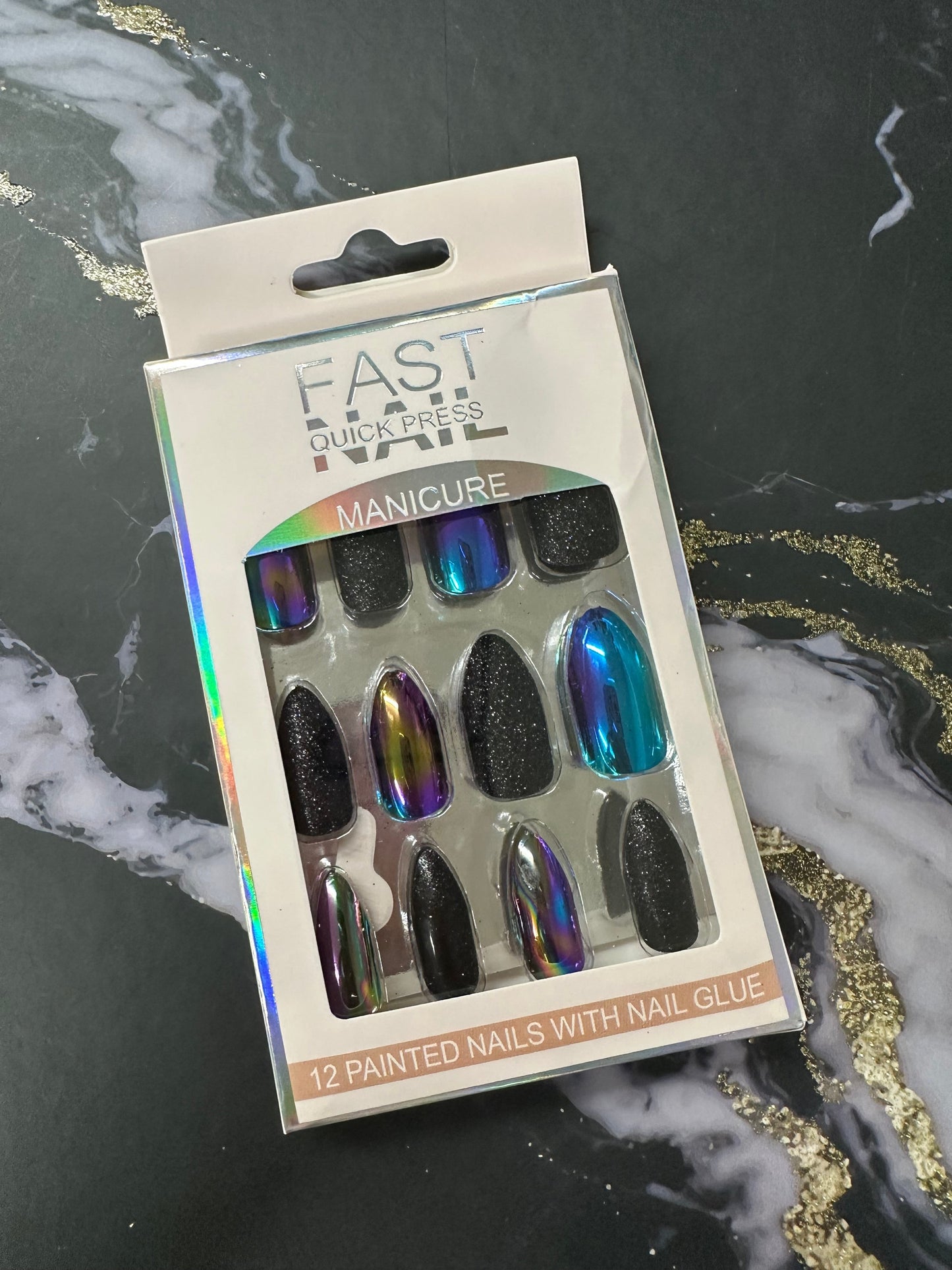 Doodlations Coffee Bar & Boutique Fast Nails Quick Press Manicure set featuring 12 black glitter and iridescent chrome almond-shaped press-on nails.