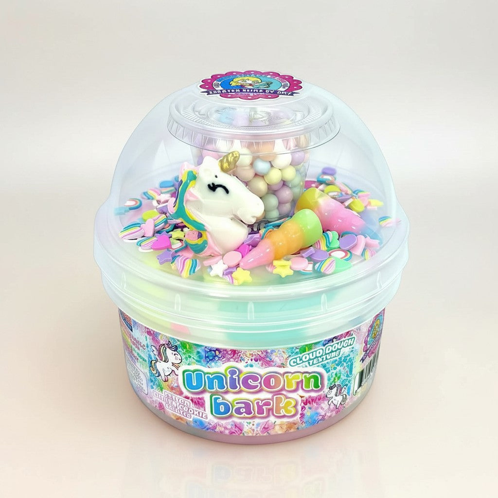Doodlations Coffee Bar & Boutique Unicorn Bark slime with pastel pink, blue, and lavender swirls, unicorn charm, candy, and sprinkles.