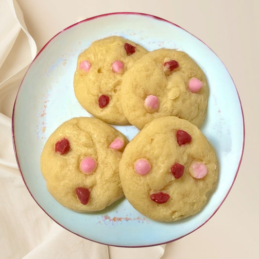 Doodlations Coffee Bar & Boutique Valentines Day Sugar Cookie Wax Melts with pink and red candy pieces.