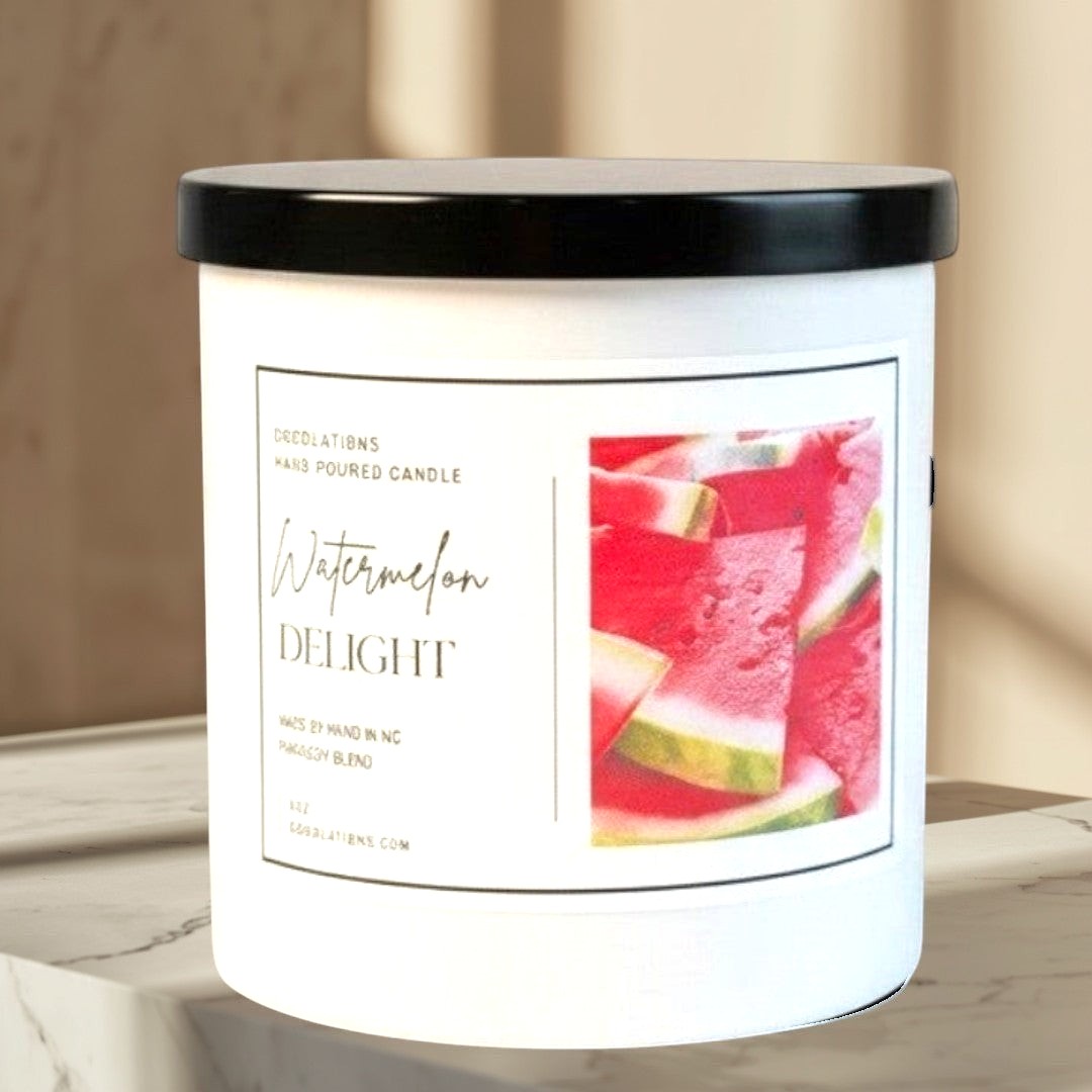 Doodlations Coffee Bar & Boutique Watermelon Delight hand-poured candle with a black lid and a label featuring sliced watermelon.