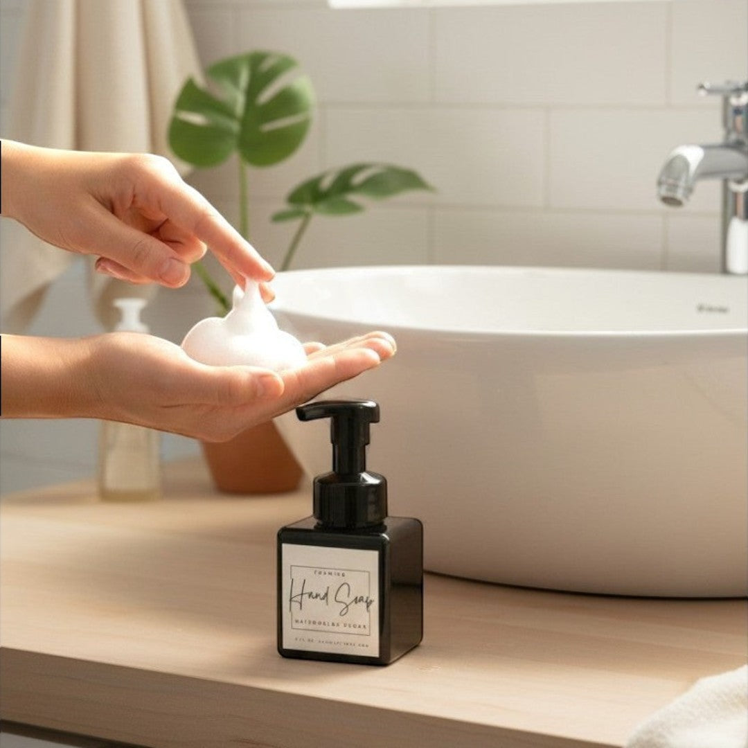 Doodlations Watermelon Sugar foaming hand soap in a black square bottle with a white label.