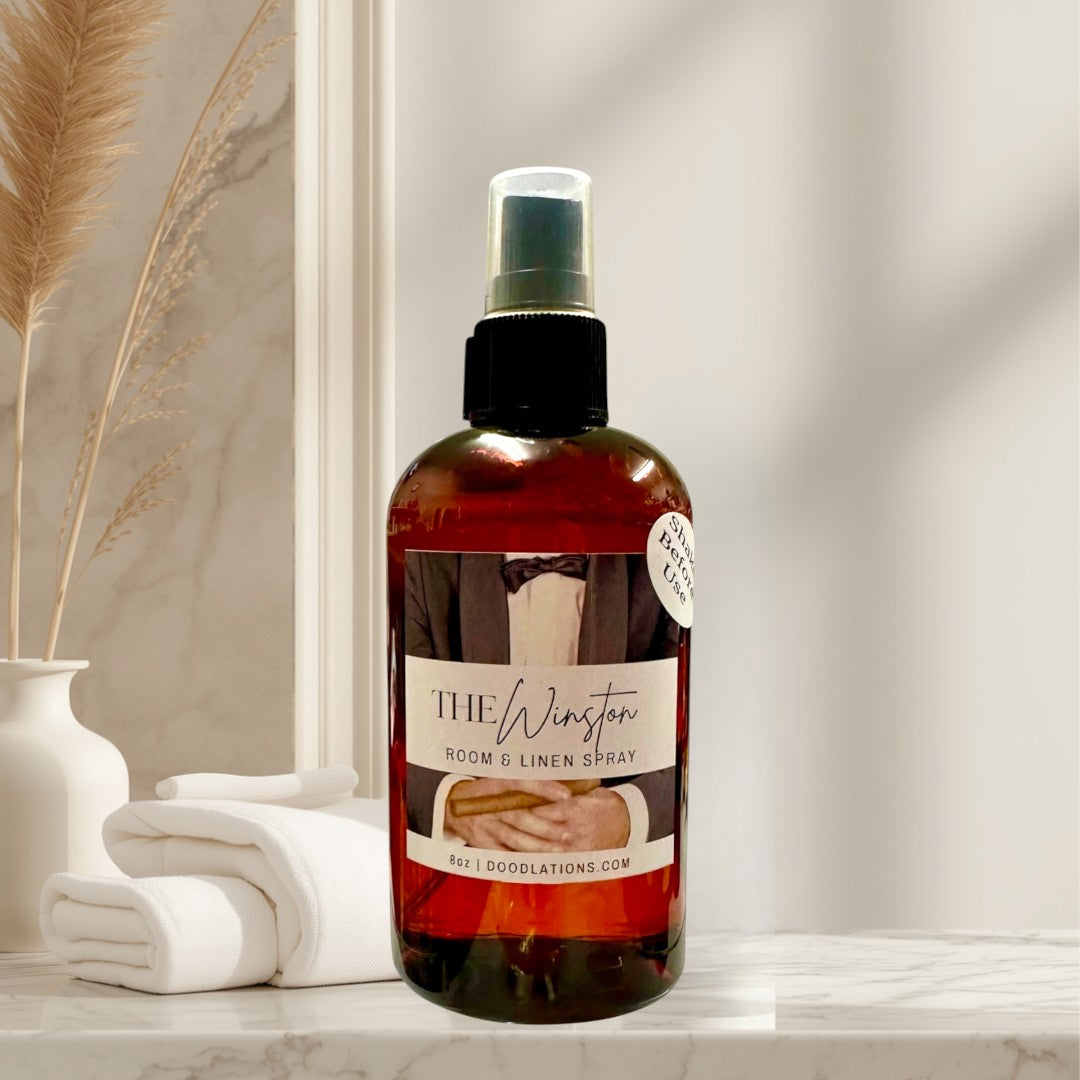 Doodlations Coffee Bar & Boutique The Winston Room & Linen Spray with tobacco, honey, amaretto, and oak notes. 8oz bottle.