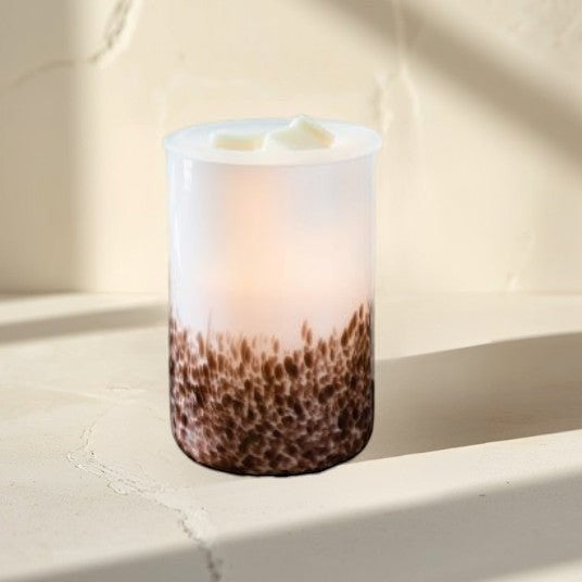 Doodlations shop
Tiger Shell Illumination Wax Warmer, frosted glass with brown speckled base, melts wax for flameless fragrance.