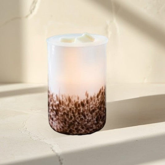 Doodlations shop
Tiger Shell Illumination Wax Warmer, frosted glass with brown speckled base, melts wax for flameless fragrance.