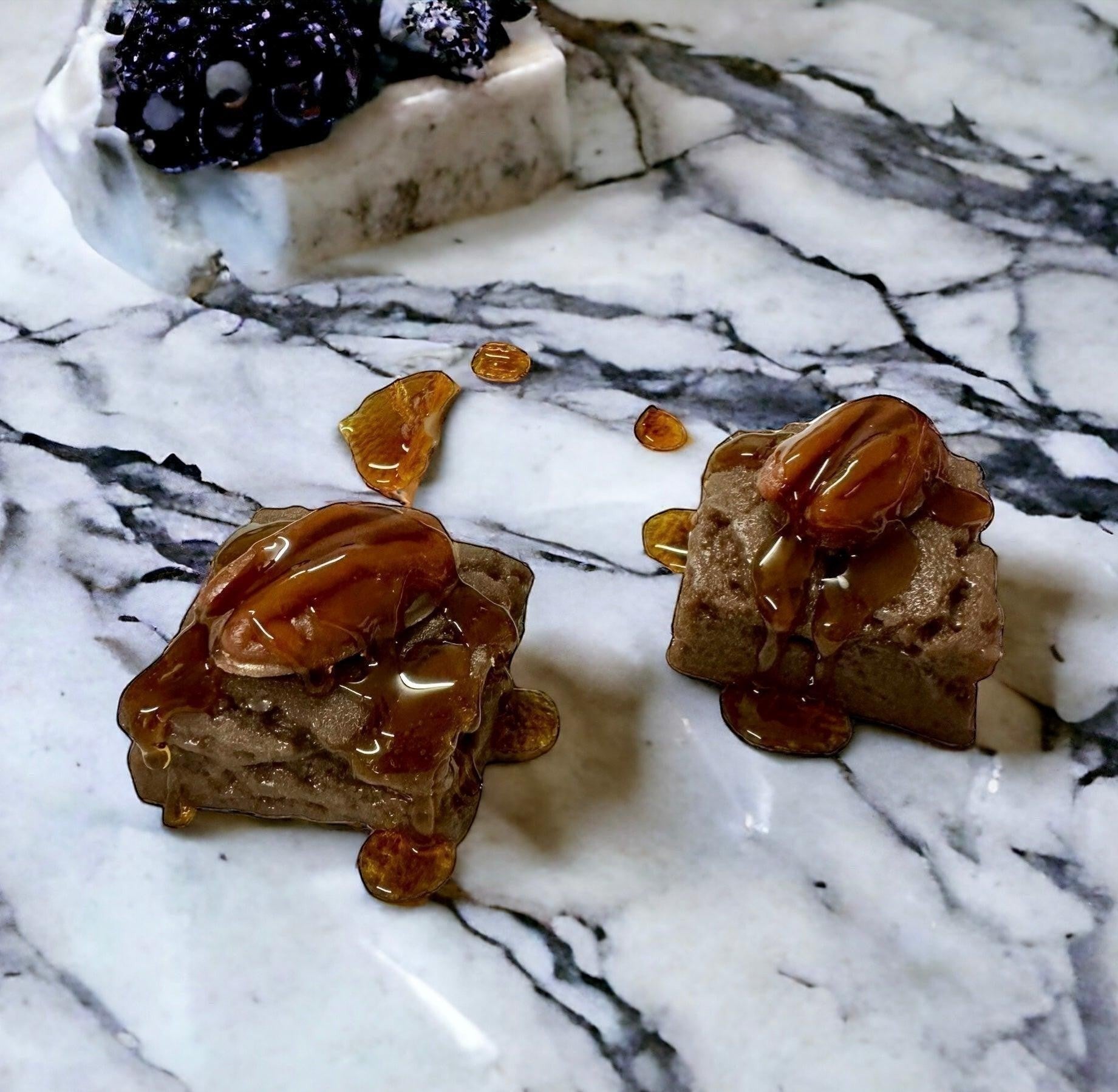 Turtle Brownie Bite Wax Melts with caramel drizzle and pecans.